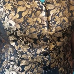 Size Medium Vest with gold floral detail